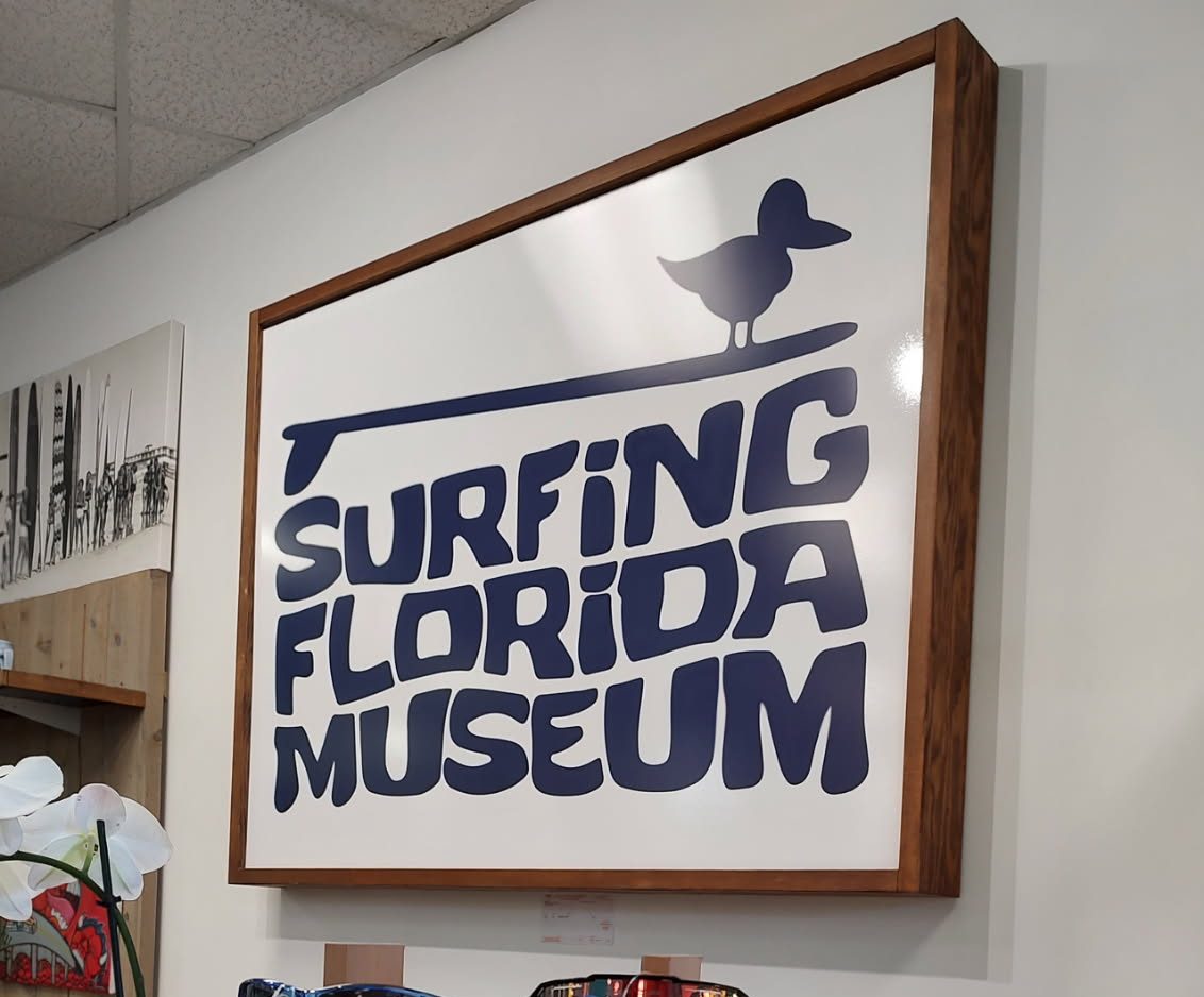 Surfing Florida Museum sign displayed inside its permanent South Dixie Highway home